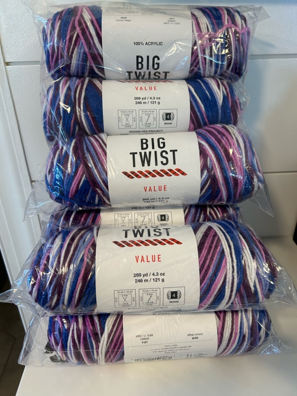 9 Big Twist Value Acrylic Yarn - Blue, Purple, White variegated